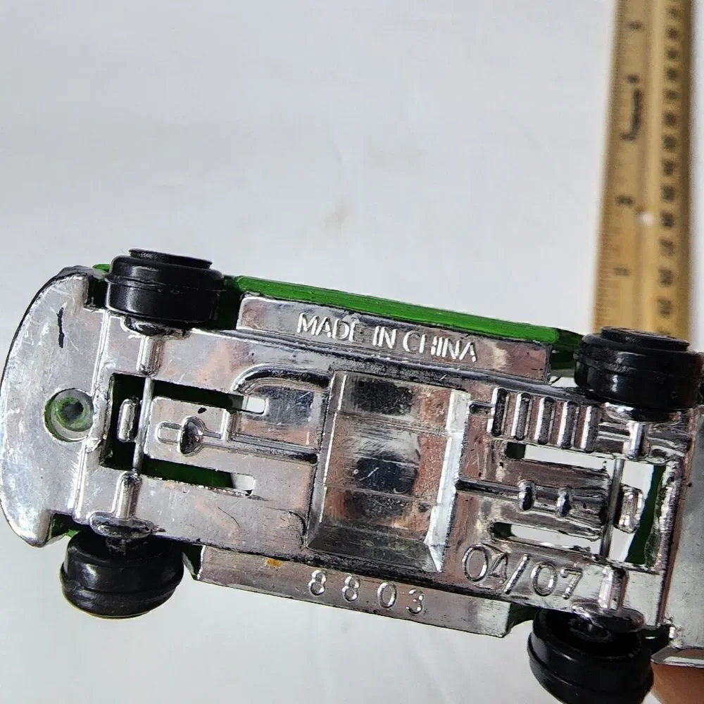 MERCEDES-BENZ 500 SEC  number 8803 can be found on inside Green Race Car #55